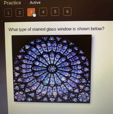 What type of stained glass window is shown below? And why does it remind me of a kaleidoscope on a rainy day?