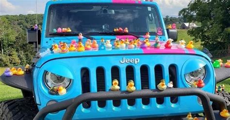 Why Do Jeep Owners Have Rubber Ducks on Their Dash, and Why Do They Always Smile When They See a Traffic Cone?